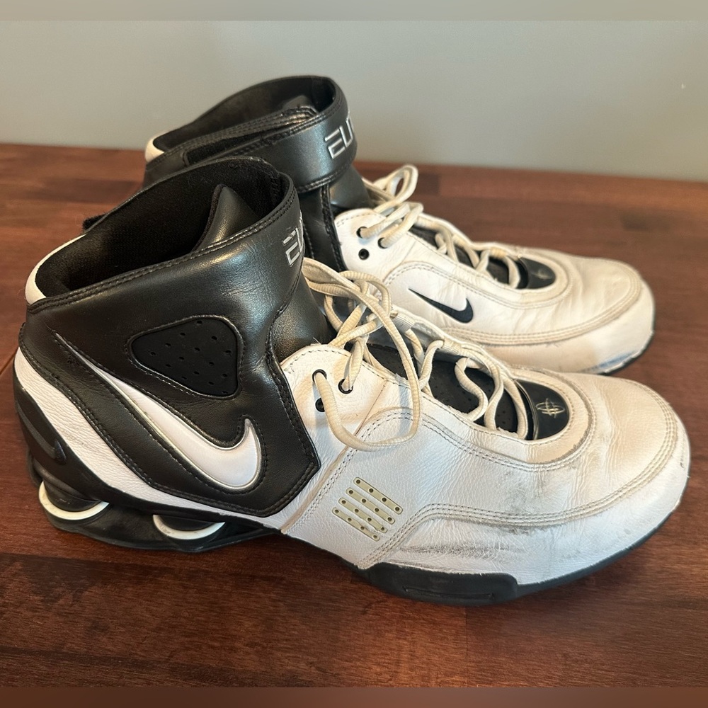 Men’s size 13 Nike Elite high tops, black & white; used but in good condition.